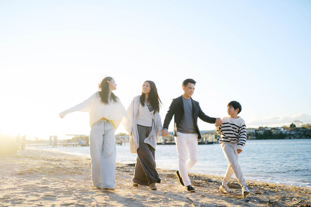 Natural family photo with soft colour palette and casual outfits
