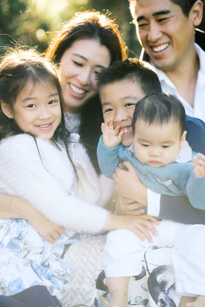 Candid family laughter captured at Wendy’s Secret Garden