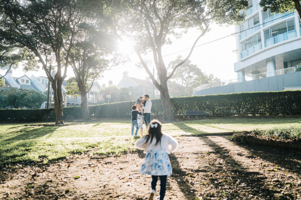 Joyful family enjoying a sunny day in a Sydney garden
